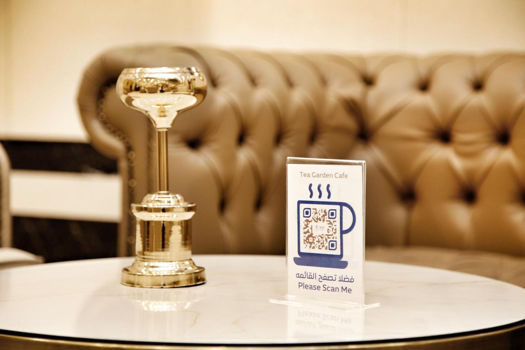 Maden Alrawda Hotel Medina ภายนอก รูปภาพ QR code in a coffee shop