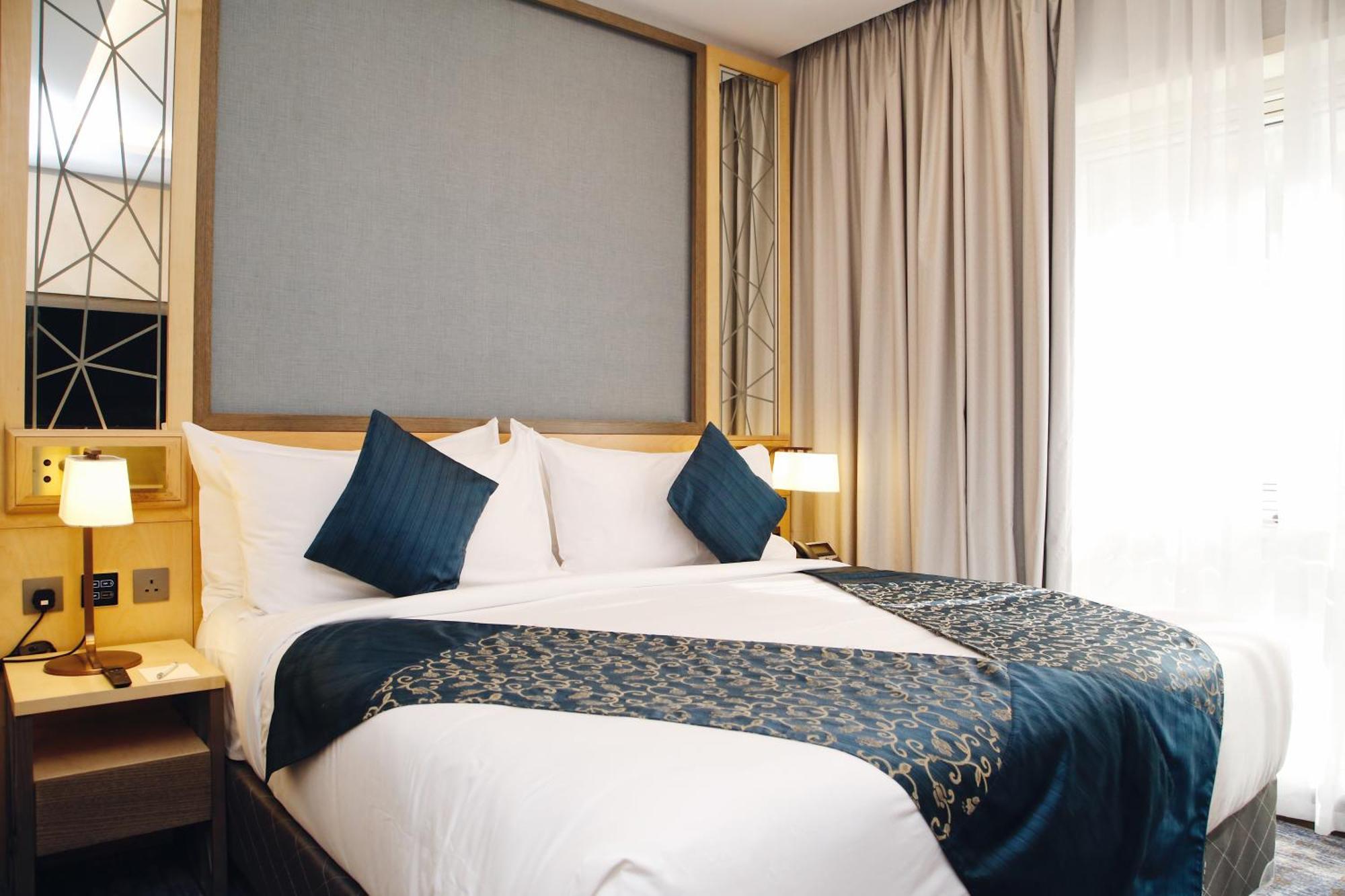 Maden Alrawda Hotel Medina ภายนอก รูปภาพ A bed runner