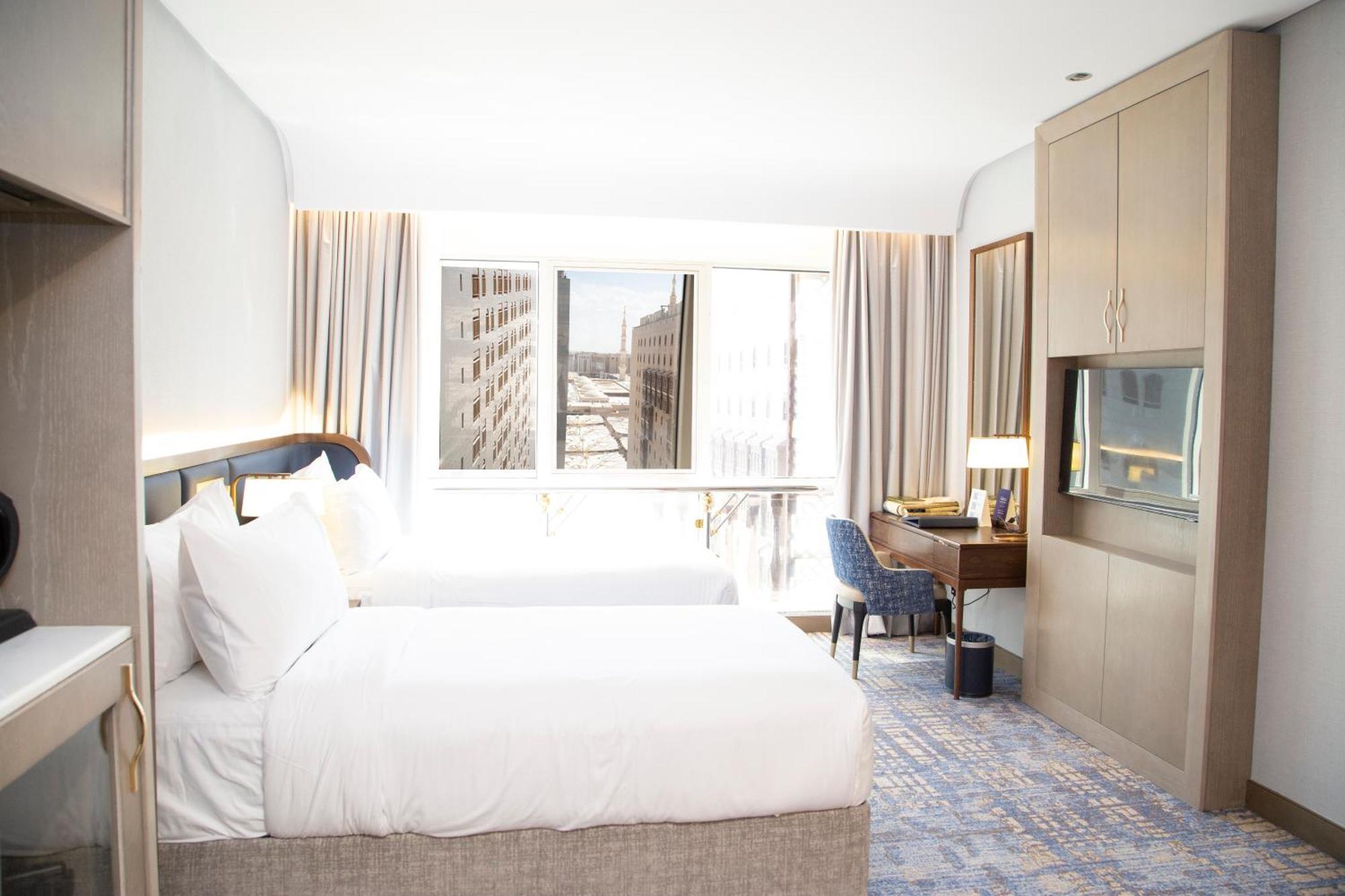 Maden Alrawda Hotel Medina ภายนอก รูปภาพ A room at the hotel